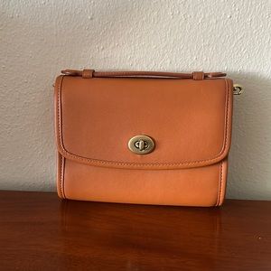 From the Coach Originals Collection, Kip Turnlock bag.  7”L x 5 1/4”H x 2” W